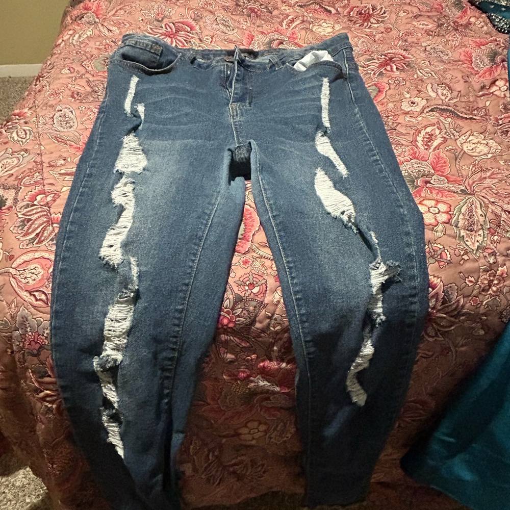Distressed Blue Denim Jeans